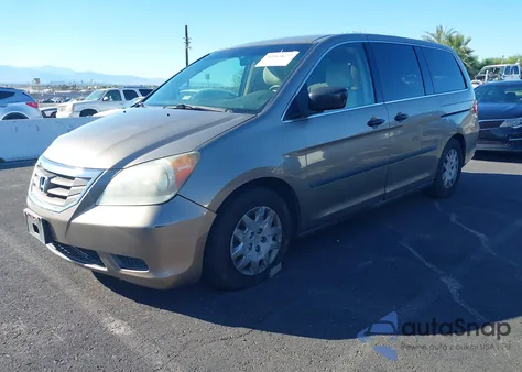 2010 Honda Odyssey Lx z USA, uszkodzony, nr VIN 5FNRL3H22AB042579